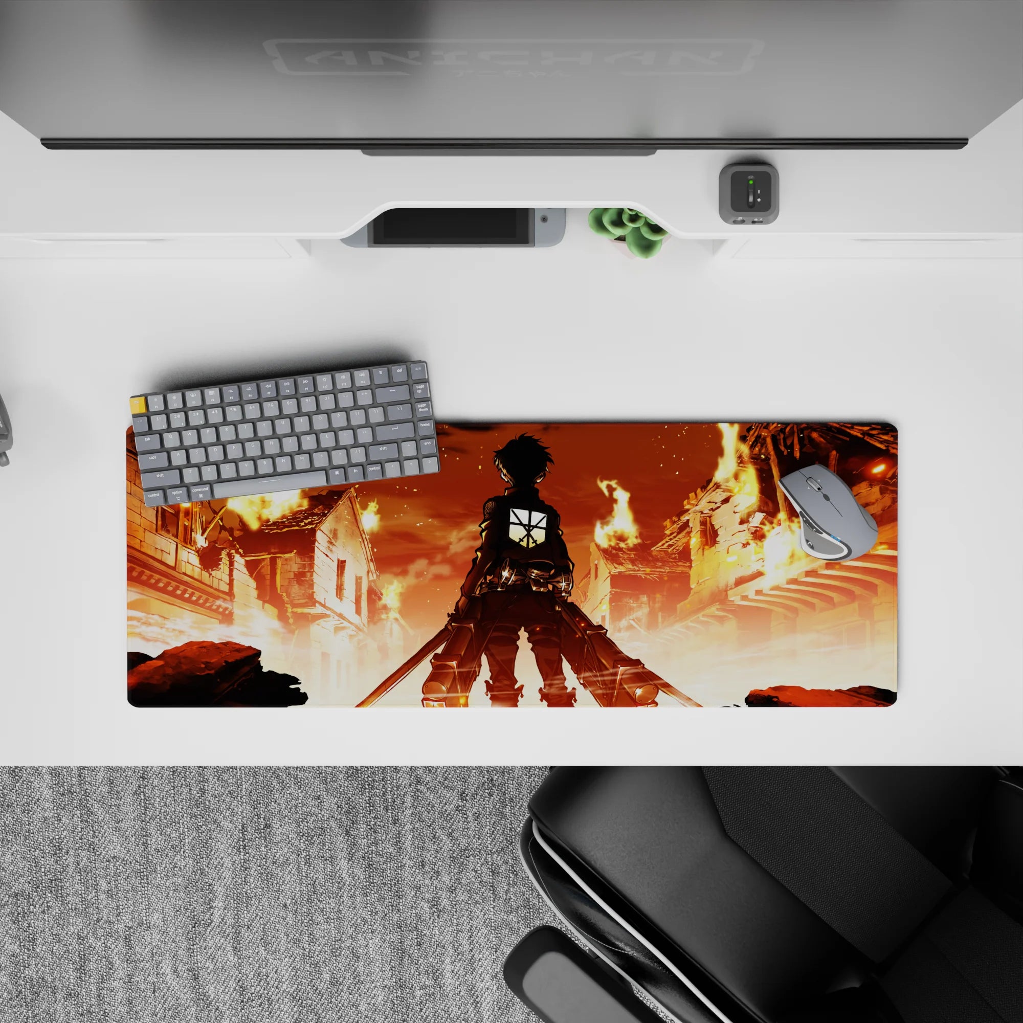 Attack on Titan mouse pad 32x12 inches featuring Eren Yeager in a city aflame, capturing his iconic stance and intense atmosphere.