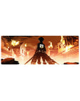 Eren Yeager stands amidst a burning city on this 32x12 inch Attack on Titan mouse pad, capturing an iconic moment.