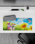 28x12 inches anime girl mouse pad in sky blue, soft green, and sunflower gold with drifting petals.