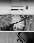 High-contrast grayscale anime desk pad 36x16 inches, smoky vortex swirls and sharp impact energy.