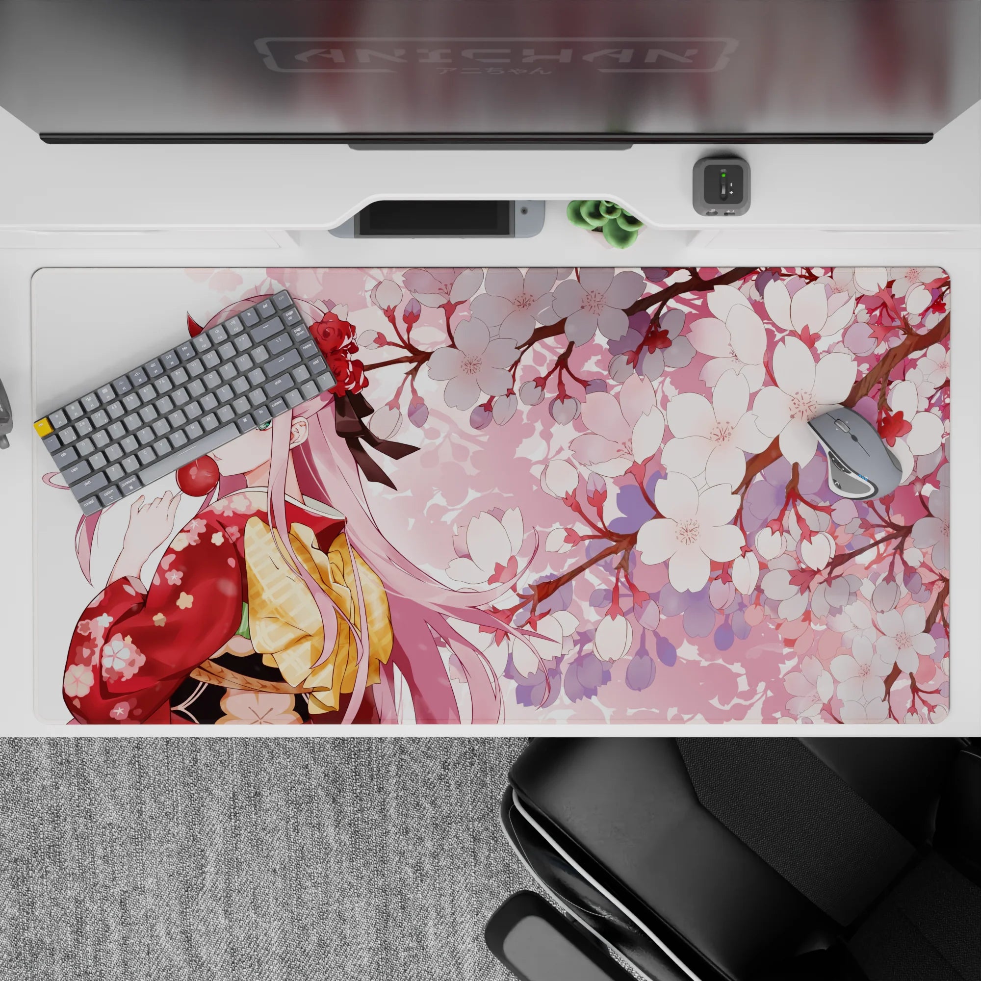 40x20 inches desk pad with Zero Two from Darling in the Franxx, showcasing her in a kimono with sakura blossoms, creating a serene and elegant atmosphere.