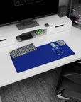 Anime mouse pad 28x12 inches showing blue-haired katana swordsman in long coat with hanging charm.