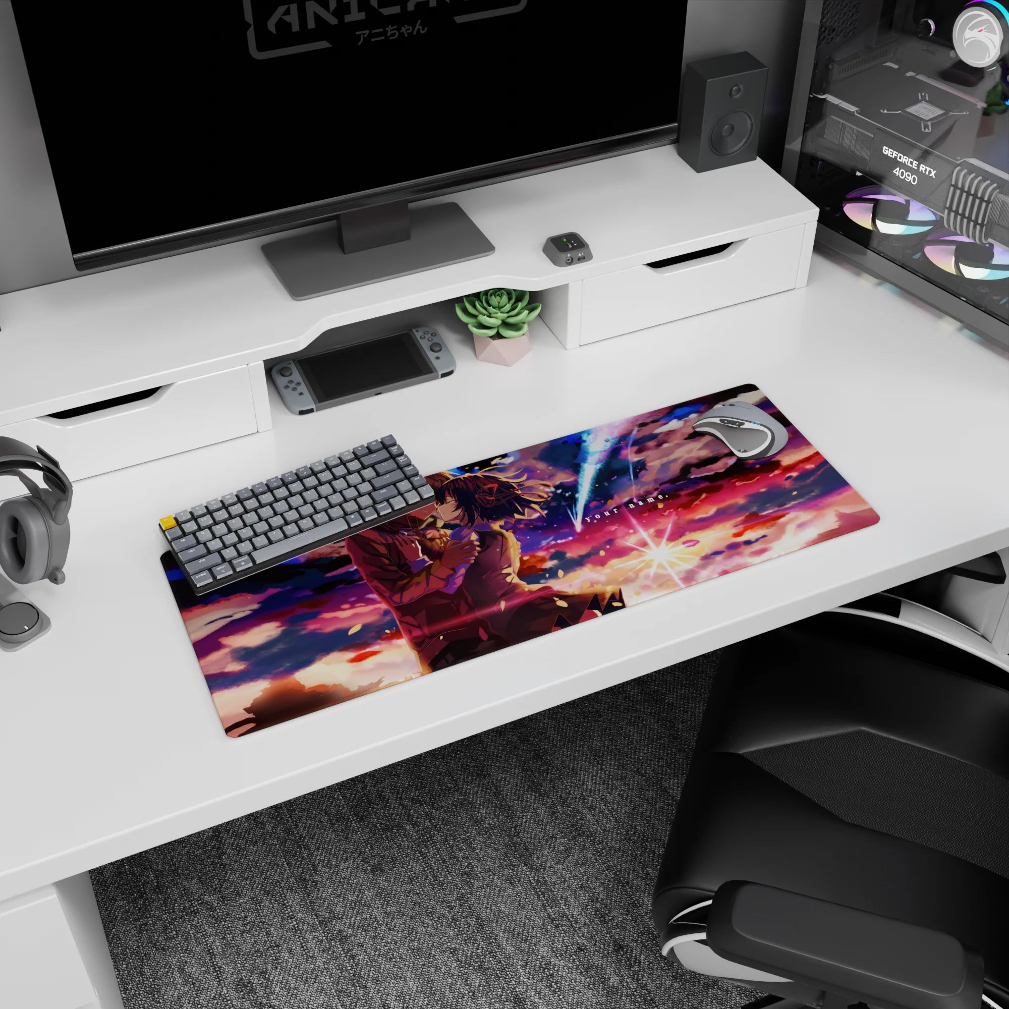 32x12 inches Your Name mouse pad with Taki and Mitsuha kissing beneath a comet, petals falling in the night sky.