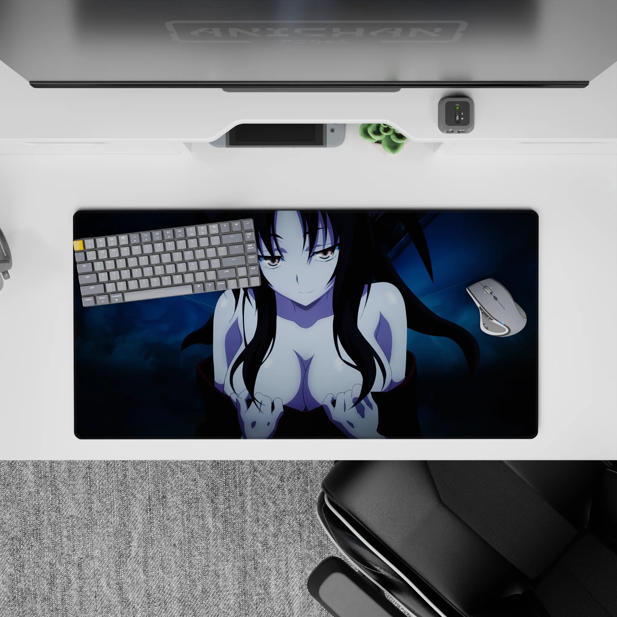 Anime mouse pad 32x16 inches with a character half-smirking, dark flowing hair, and icy blue background, perfect for fans.
