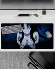 Anime mouse pad 32x16 inches with a character half-smirking, dark flowing hair, and icy blue background, perfect for fans.