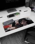 Anime mouse pad 32x12 inches featuring Reze from Chainsaw Man, serene expression, red hair clips, blurred city traffic.