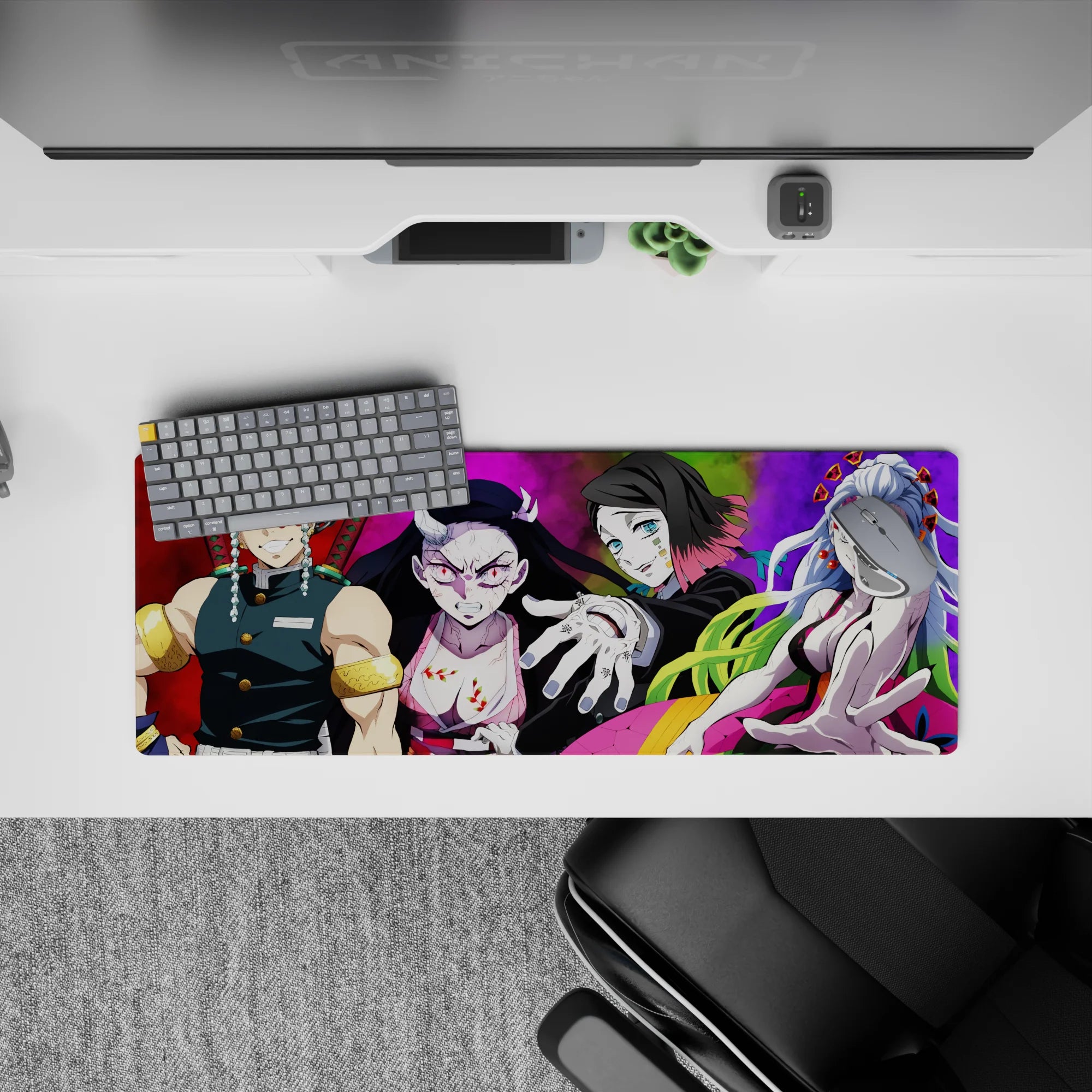 Anime mouse pad 32x12 inches featuring Tengen Uzui, Nezuko, Gyutaro, and Daki from Demon Slayer in vibrant colors.