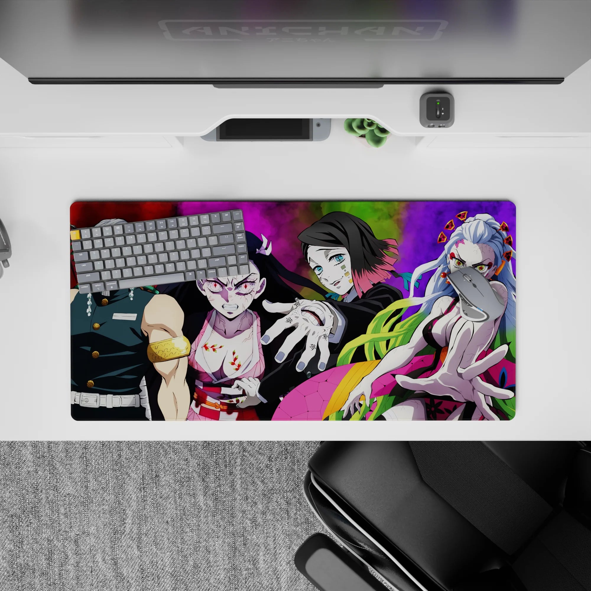 Anime mouse pad 32x16 inches featuring Tengen Uzui, Nezuko, Gyutaro, and Daki from Demon Slayer in vibrant colors.