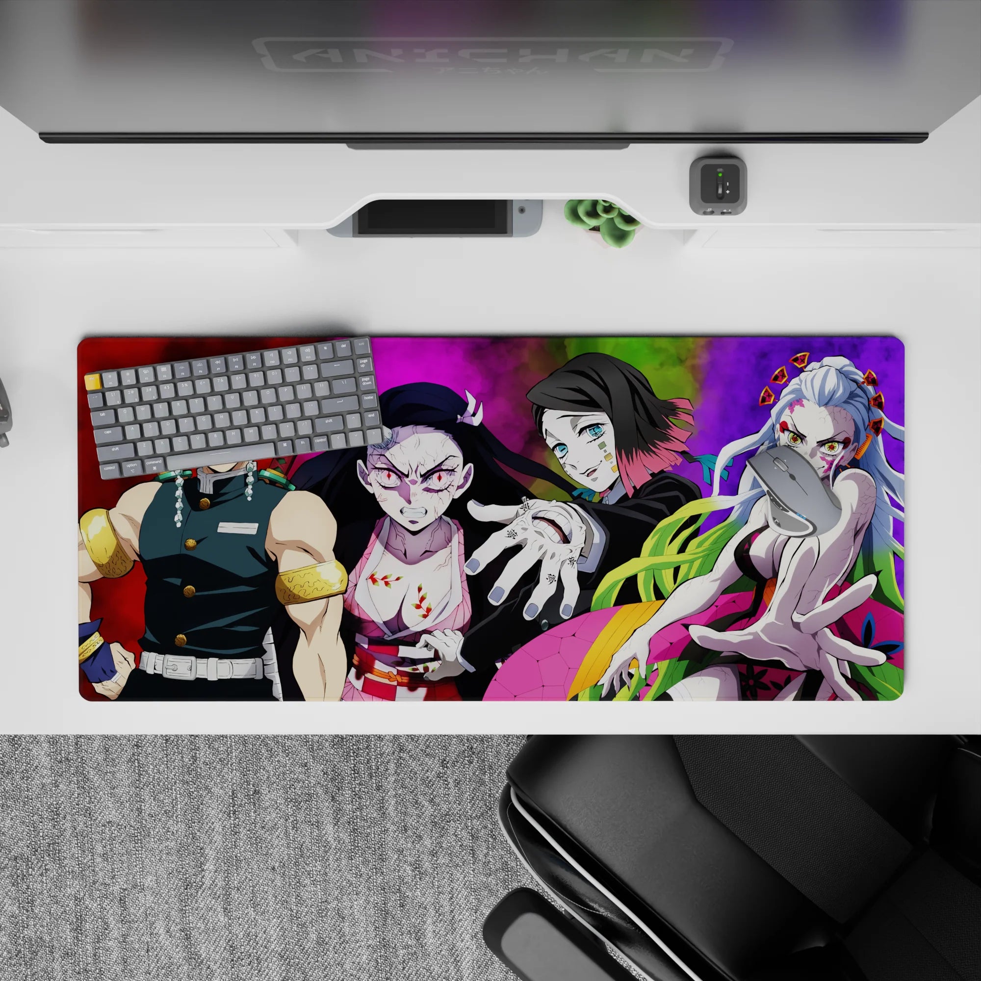 Anime desk pad 36x16 inches featuring Demon Slayer's Tengen Uzui, Nezuko, Gyutaro, and Daki with vibrant backgrounds.