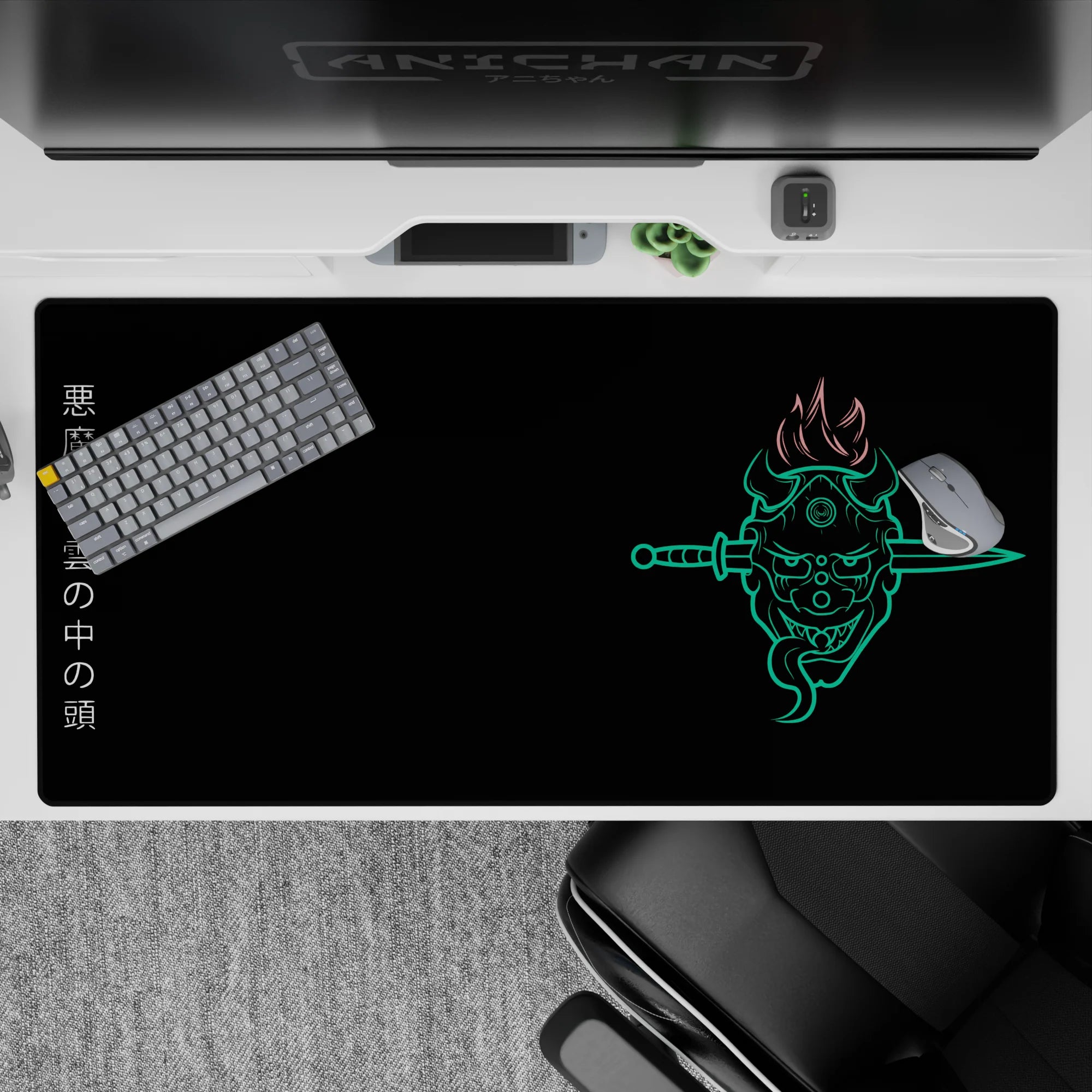 Anime desk pad 40x20 inches featuring a neon oni mask with twin blades, fiery hair, and Japanese kanji on a black backdrop.