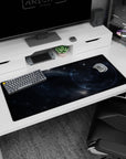 Arcane circle emblem on a starry midnight cloud desk pad, 36x16 inches, like a secret cosmic map.
