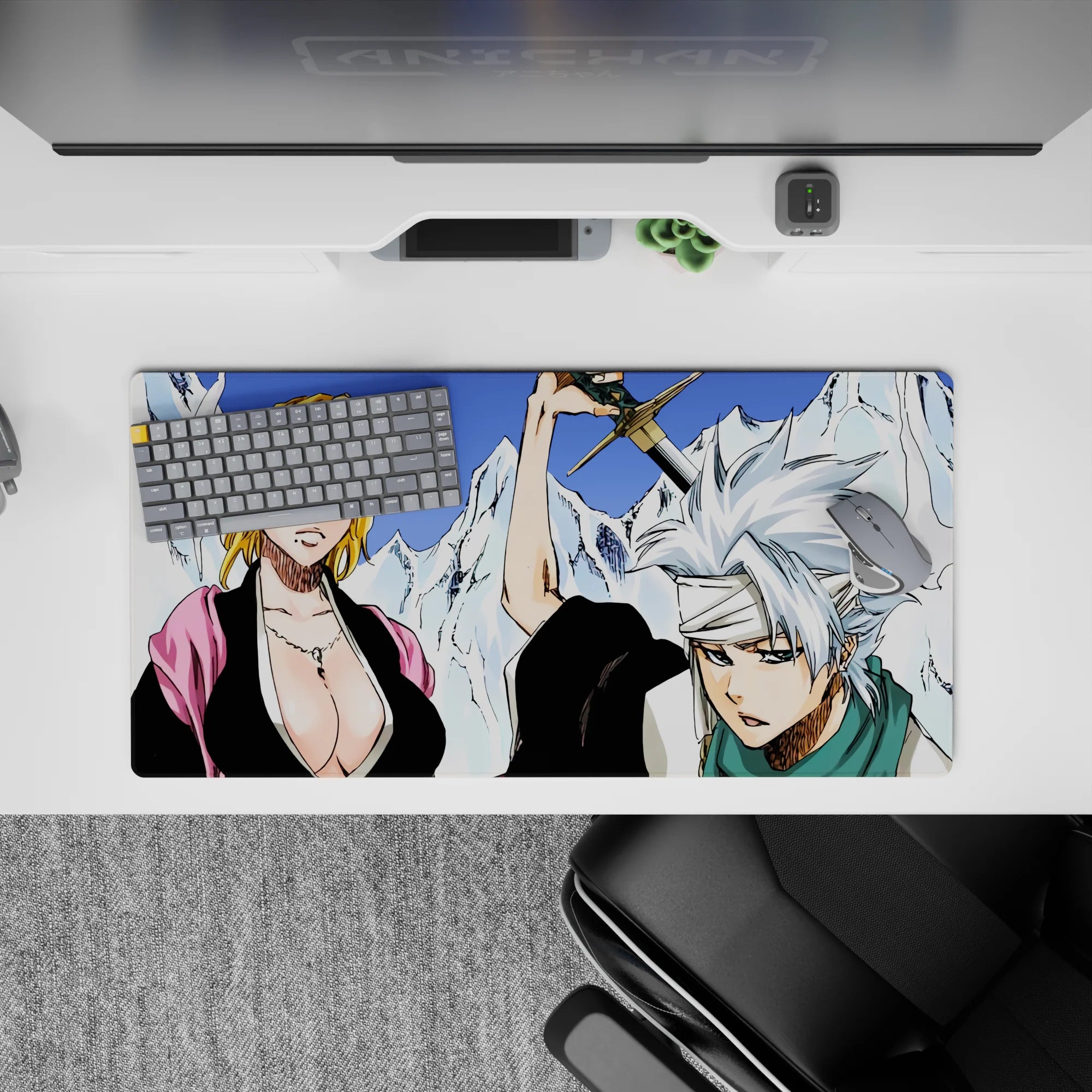 Mouse pad 32x16 inches featuring Rangiku and Tōshirō from Bleach, showcasing icy mountains and bold character lines.