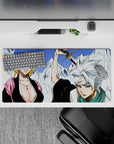 Mouse pad 32x16 inches featuring Rangiku and Tōshirō from Bleach, showcasing icy mountains and bold character lines.