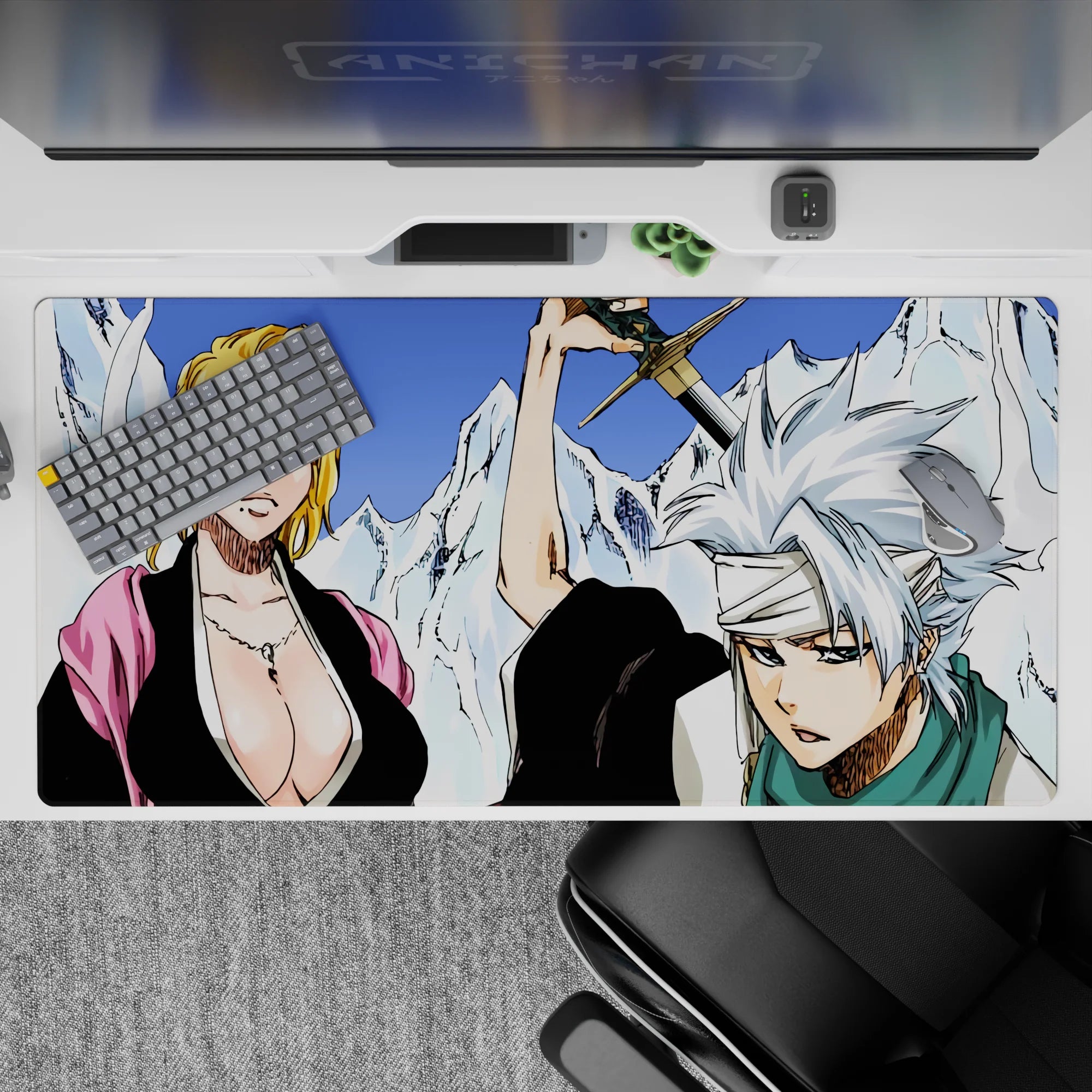 Desk pad 40x20 inches featuring Bleach's captains Rangiku and Tōshirō with ice mountains in stark whites and blues.