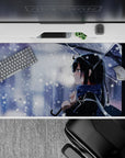 Cool blue-gray snowy romance anime desk pad 40x20 inches with crisp whites, soft sparkle flakes, calm mood.