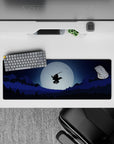 Anime mouse pad 32x12 inches featuring a lone samurai mid-air against a full moon, with layered forests and mountains.