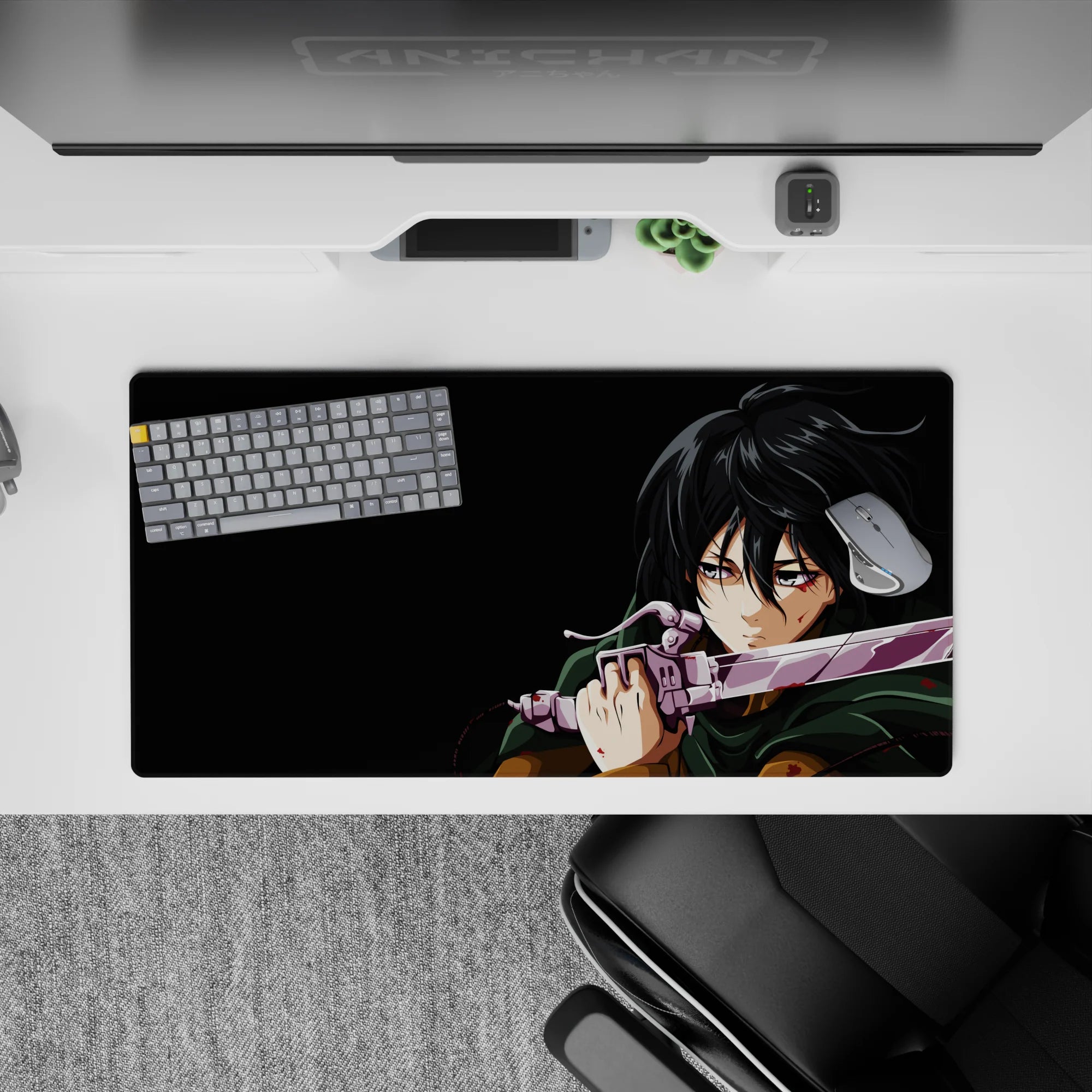 Mikasa Ackerman from Attack on Titan in battle on a 32x16 inch anime mouse pad, featuring her intense gaze and iconic cloak.