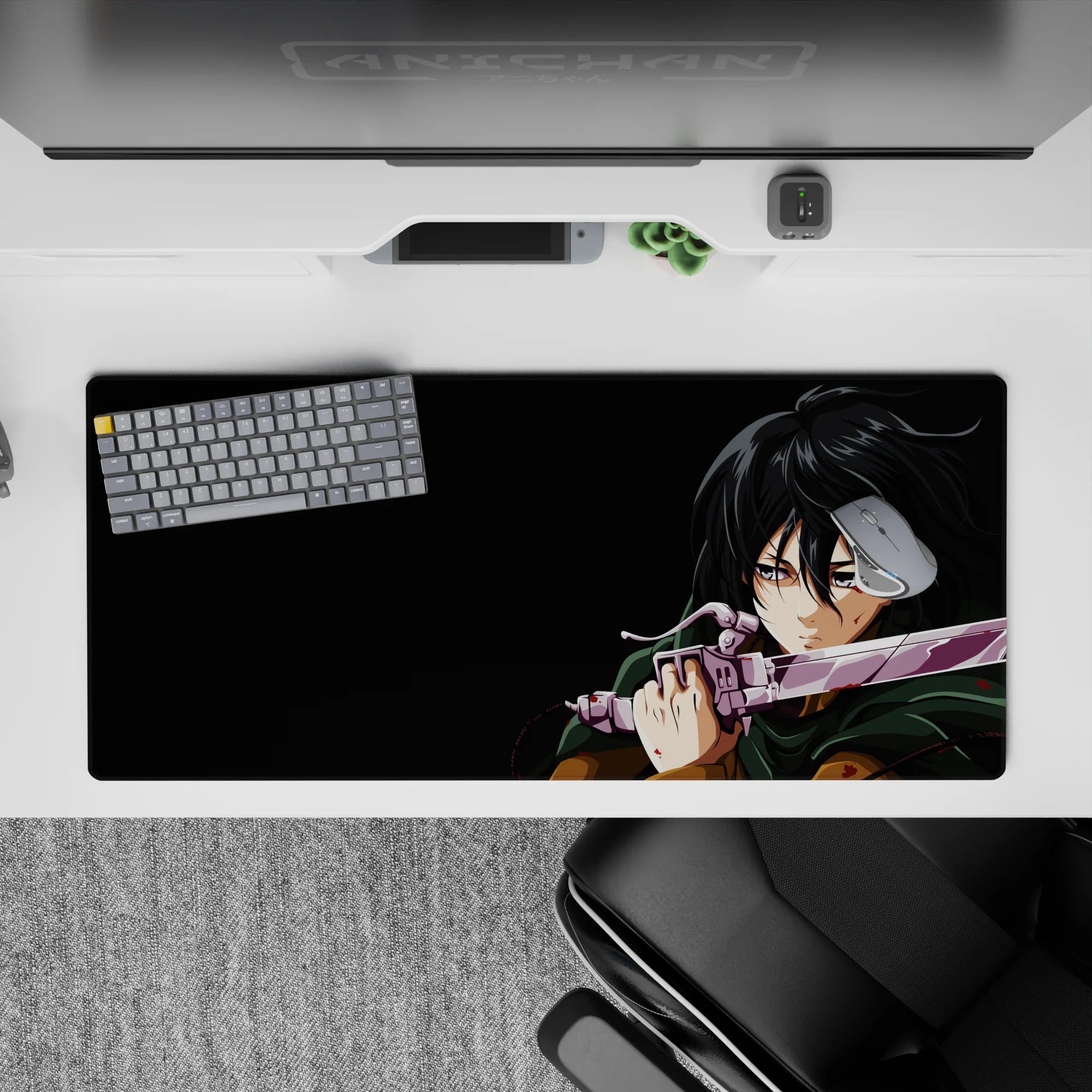 Mikasa Ackerman-themed Attack on Titan desk pad 36x16 inches with intense battle scene, deep green cloak, and violet steel.
