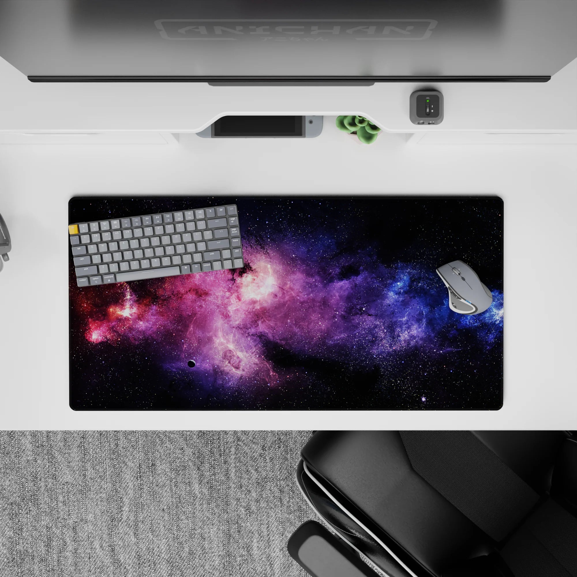 Dreamy purple haze and electric blue on midnight black mouse pad 32x16 inches, calming space vibe.