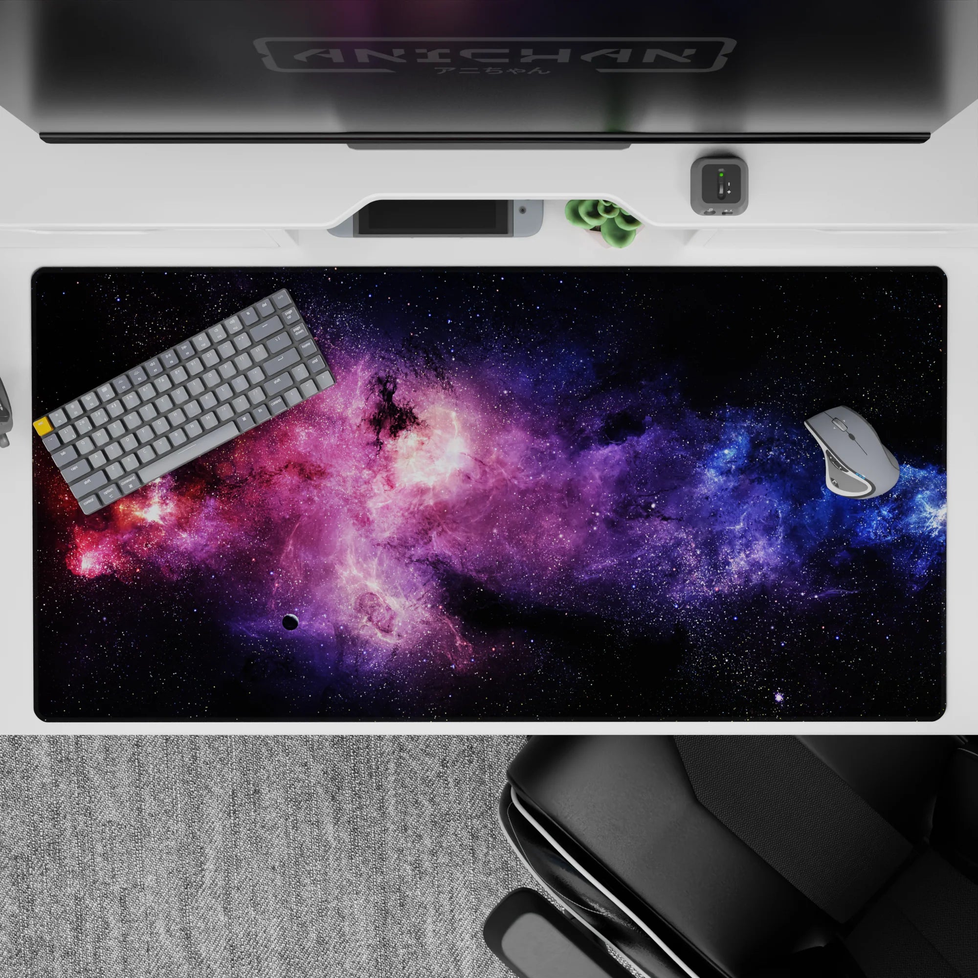 Purple haze and electric blue on midnight black desk pad 40x20 inches for a calm cosmic mood.