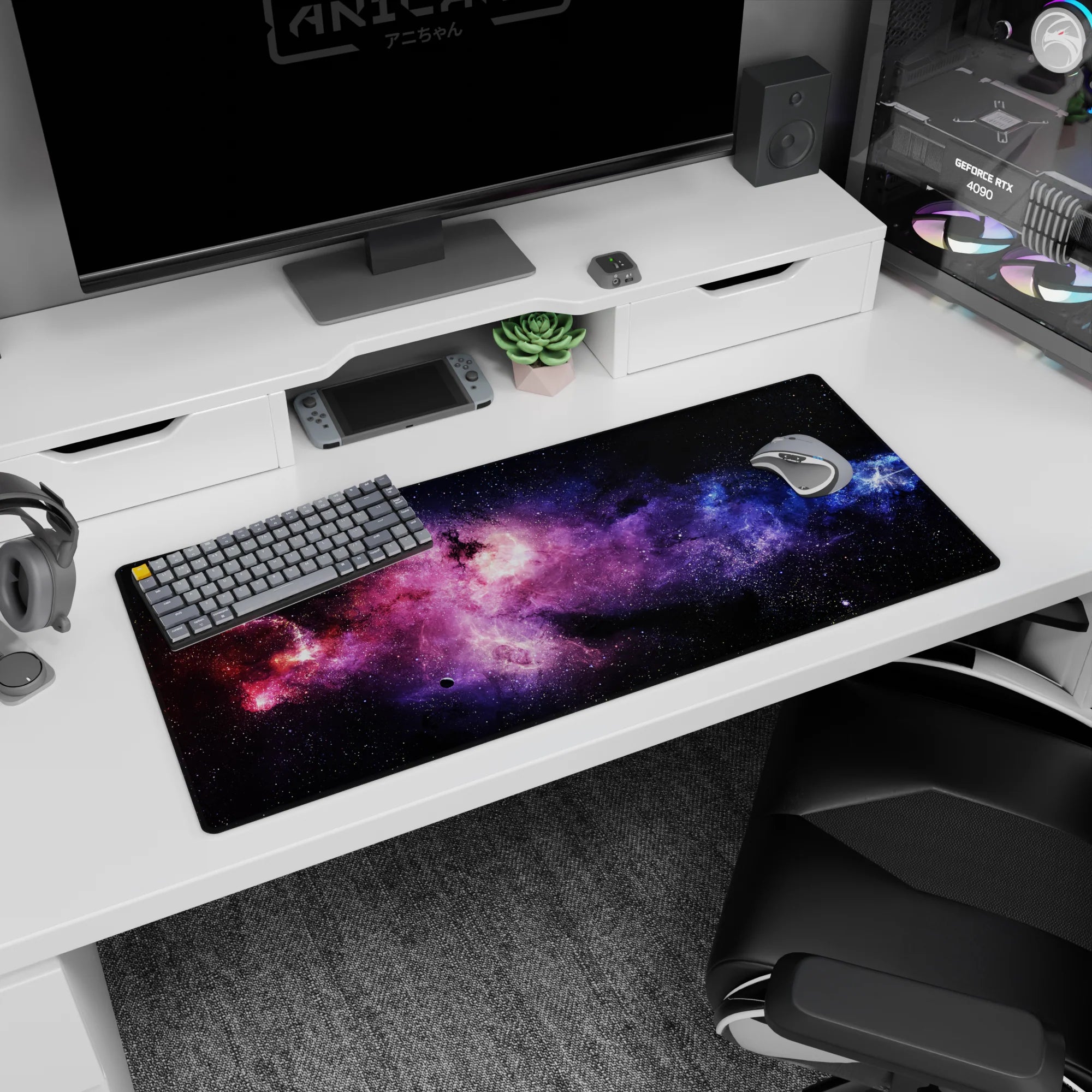 Deep space scene desk pad 36x16 inches with glitter-like stars and cosmic swirls across the surface.
