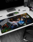 Dark-haired anime girl desk pad 40x20 inches, lounging on a balcony chair reading with coffee.