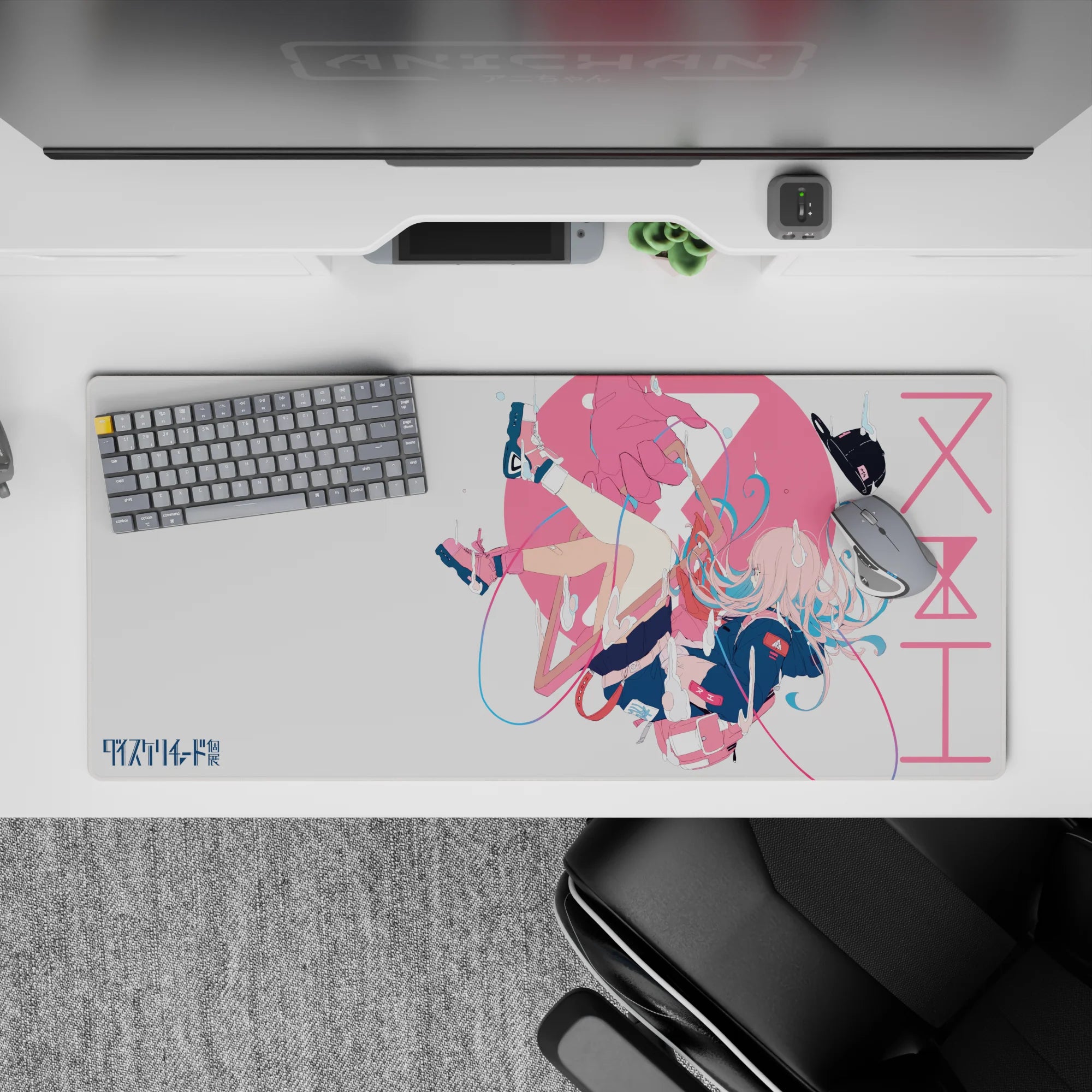 36x16 inches desk pad in pink and white splashes with blue accents, cozy playful anime vibe.