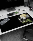 Blonde anime warrior on desk pad 40x20 inches holding a tiny starry spark, harness details and blade.