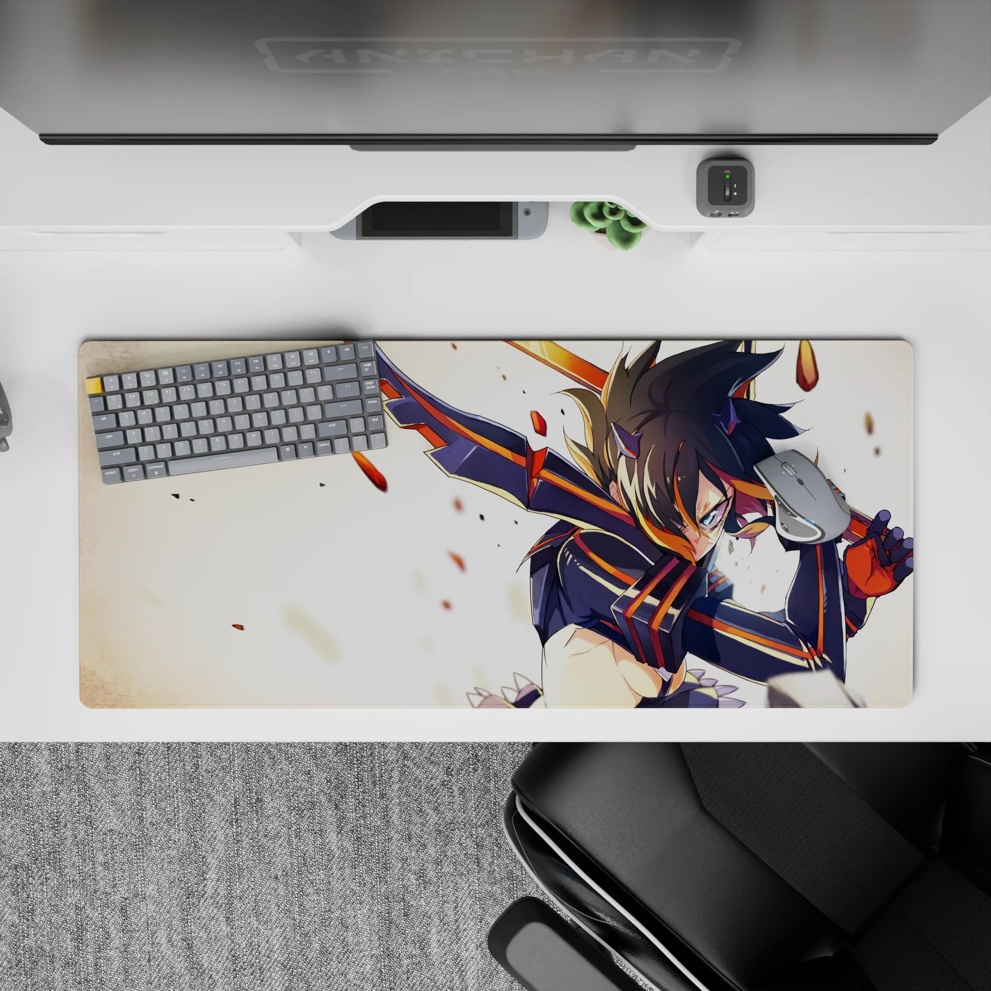 Cinematic anime desk pad 36x16 inches in black and orange with warm sparks, bold high-speed vibe.