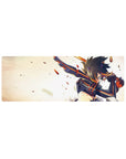 Anime girl mouse pad 32x12 inches with armored racer suit, orange stripes, spiked hair, action pose.
