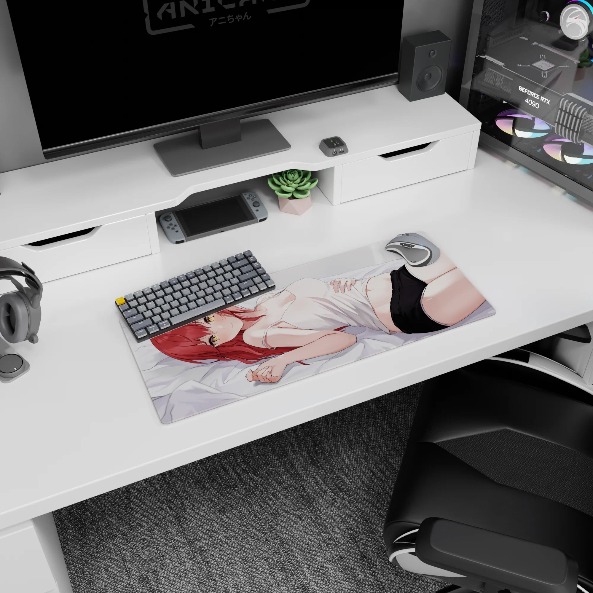 28x12 inches anime girl mouse pad showing red-haired girl in white camisole on pale gray sheets with sly look.