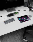 Anime mouse pad 14x10 inches showing a bright cyberpunk skyline at night, glowing towers over a desk.