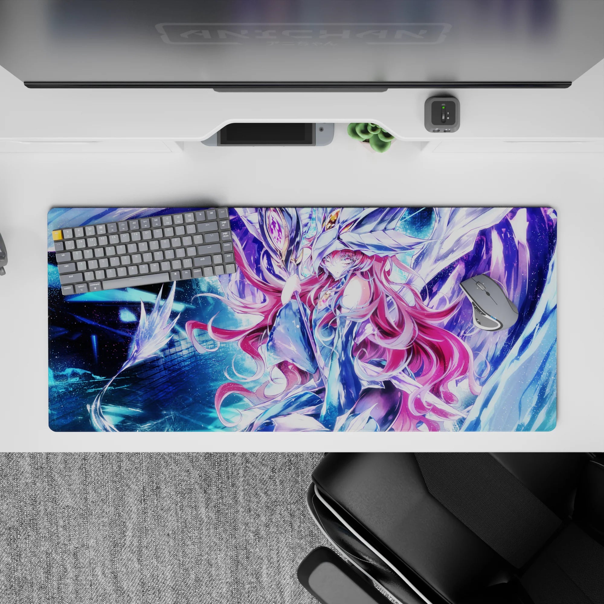36x16 inches anime desk pad in electric blues and icy purples, dreamy nebula glow with star-spark highlights.