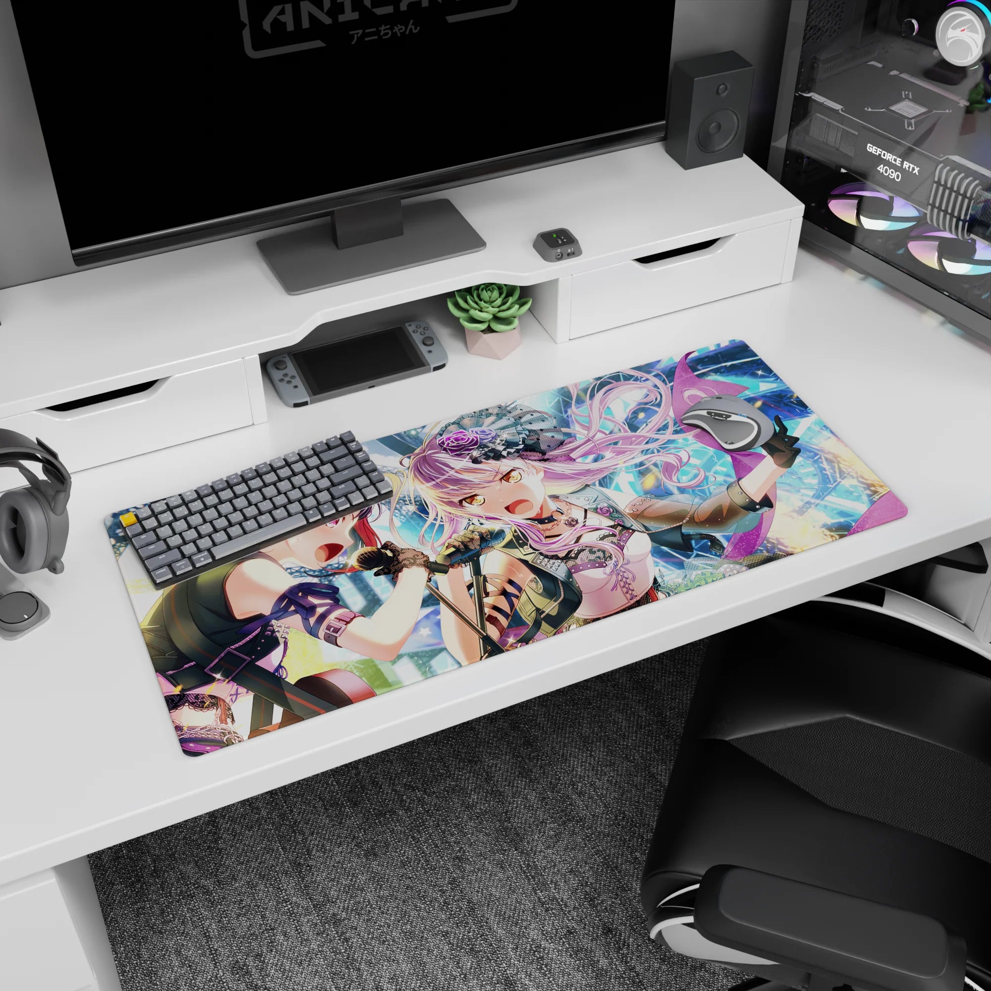 36x16 inches desk pad showing two anime idols belting into microphones, rose mini hat and fierce stage glare.