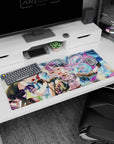 36x16 inches desk pad showing two anime idols belting into microphones, rose mini hat and fierce stage glare.