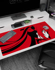 Side-profile anime girl 40x20 inches desk pad with long twin tails, chunky bows, and sharp red eyes.
