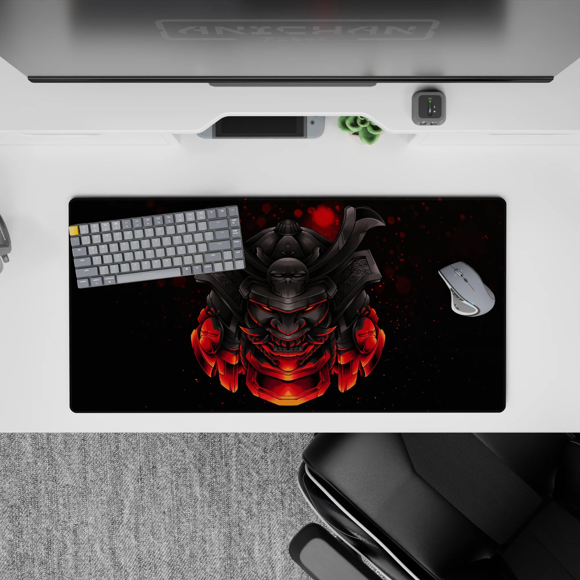 Anime mouse pad 32x16 inches with samurai mask design, featuring deep blacks and red glows for fans of Japanese armor.