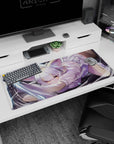 Silver-haired catgirl pouncing with paws out and amber eyes, swirly slash accents desk pad 36x16 inches.