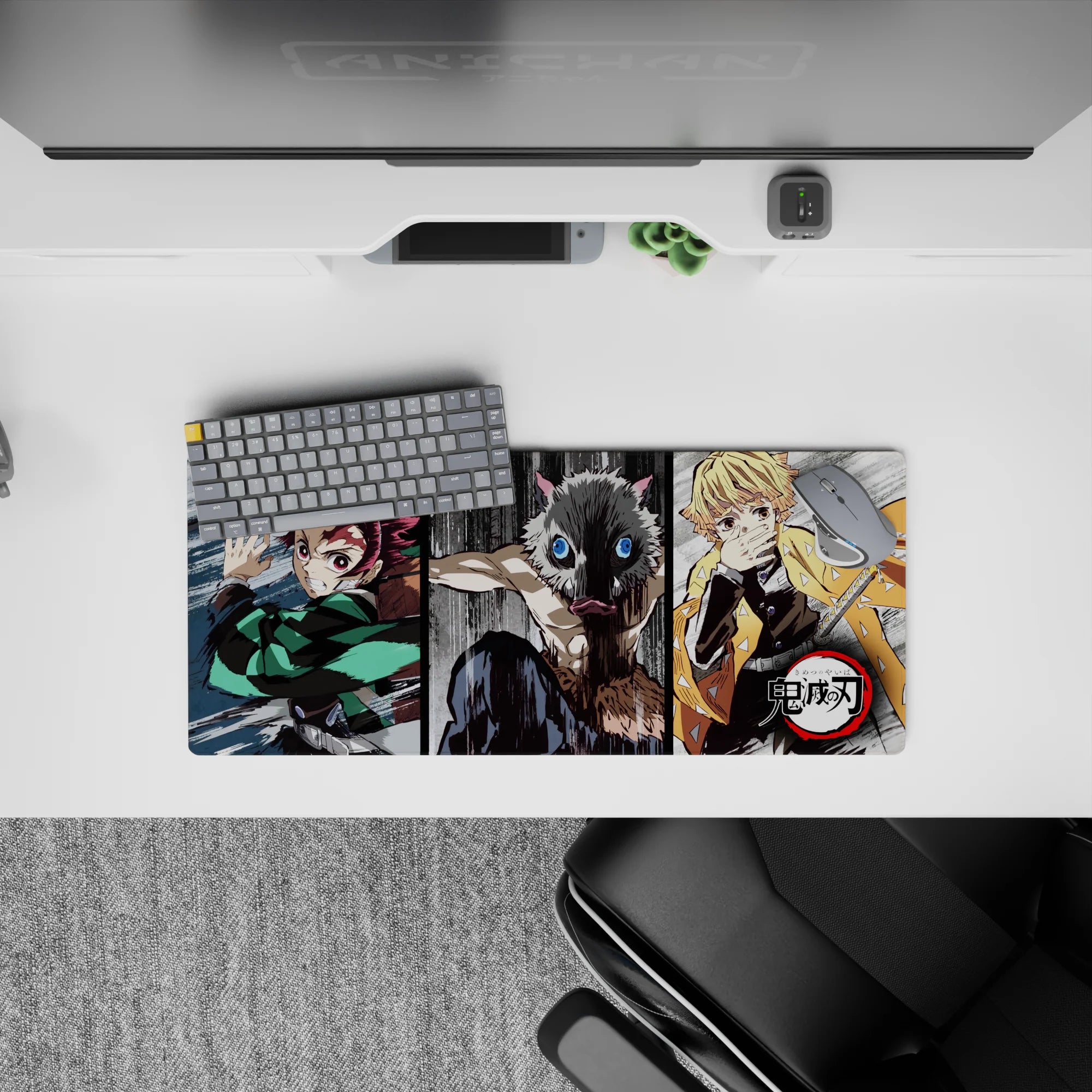 Anime mouse pad 28x12 inches featuring Tanjiro, Inosuke, and Zenitsu from Demon Slayer in dynamic sketch-style action.