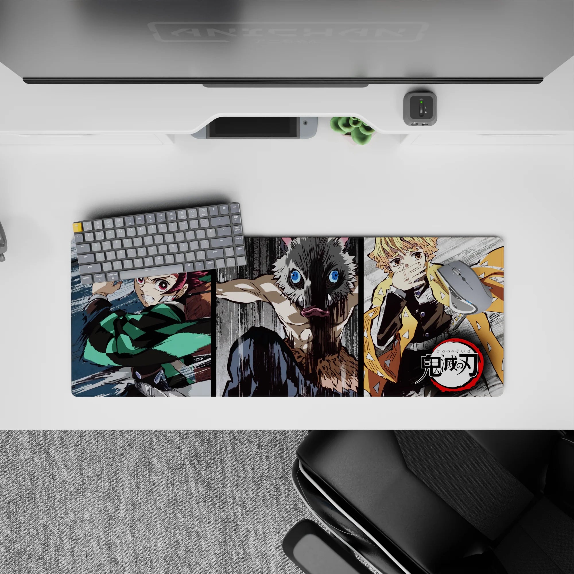 Gritty 32x12 inch anime mouse pad featuring Tanjiro, Inosuke, and Zenitsu from Demon Slayer in dynamic, sketch-style action.