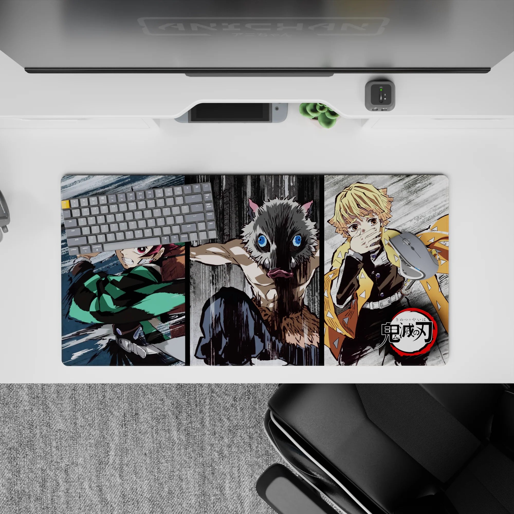 Anime mouse pad 32x16 inches featuring Tanjiro, Inosuke, and Zenitsu from Demon Slayer in dynamic sketch-style action.