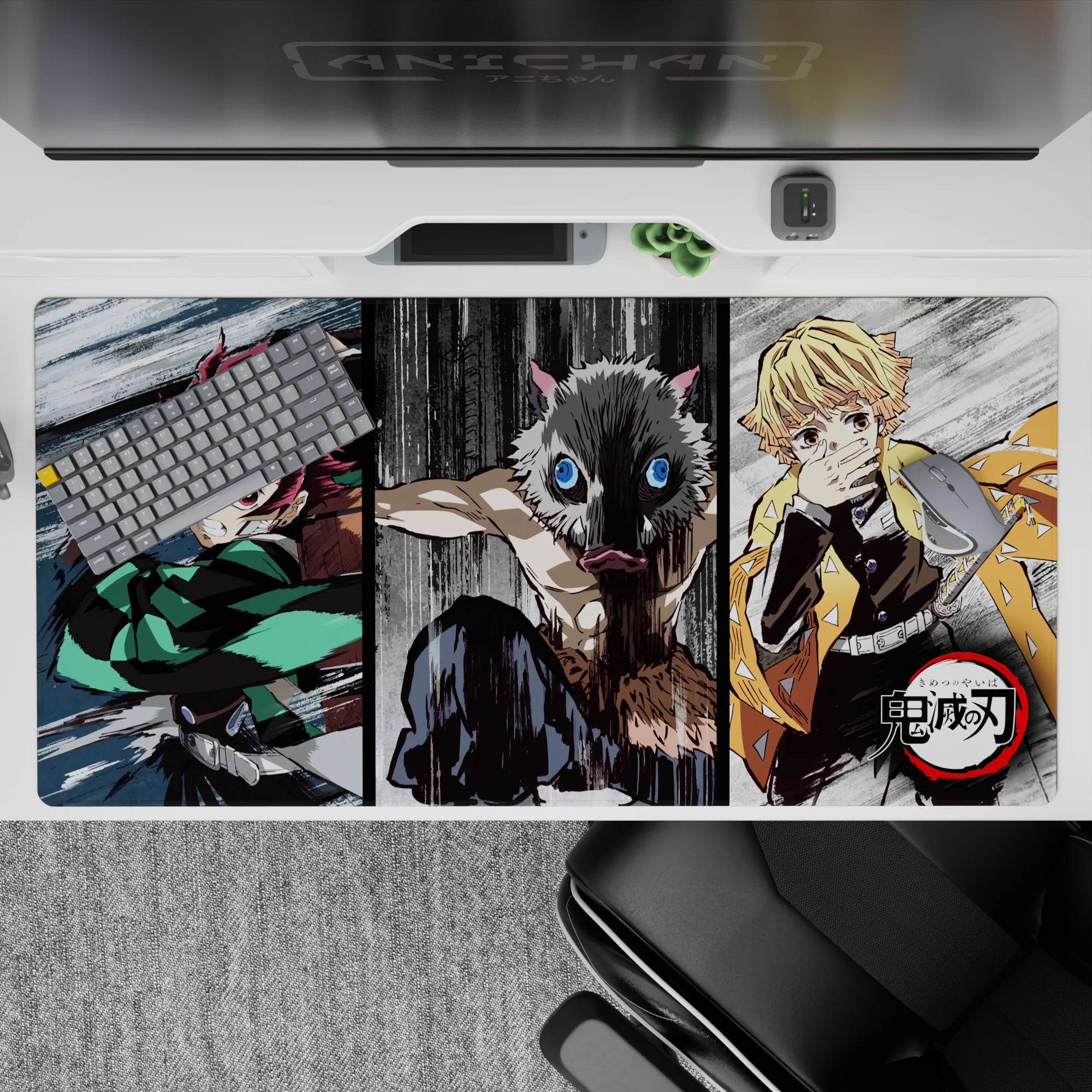 Anime mouse pad 40x20 inches featuring Tanjiro, Inosuke, and Zenitsu from Demon Slayer in a dynamic, sketch-style battle.