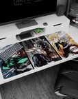 Anime desk pad 40x20 inches featuring Tanjiro, Inosuke, and Zenitsu from Demon Slayer in dynamic sketch-style brawl.