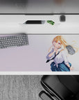 Pastel anime desk pad 36x16 inches in airy tones, blonde girl with violet eyes and breezy hair.