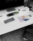 Anime schoolgirl mouse pad 14x10 inches, blonde with violet eyes doing finger-to-lips shh pose.