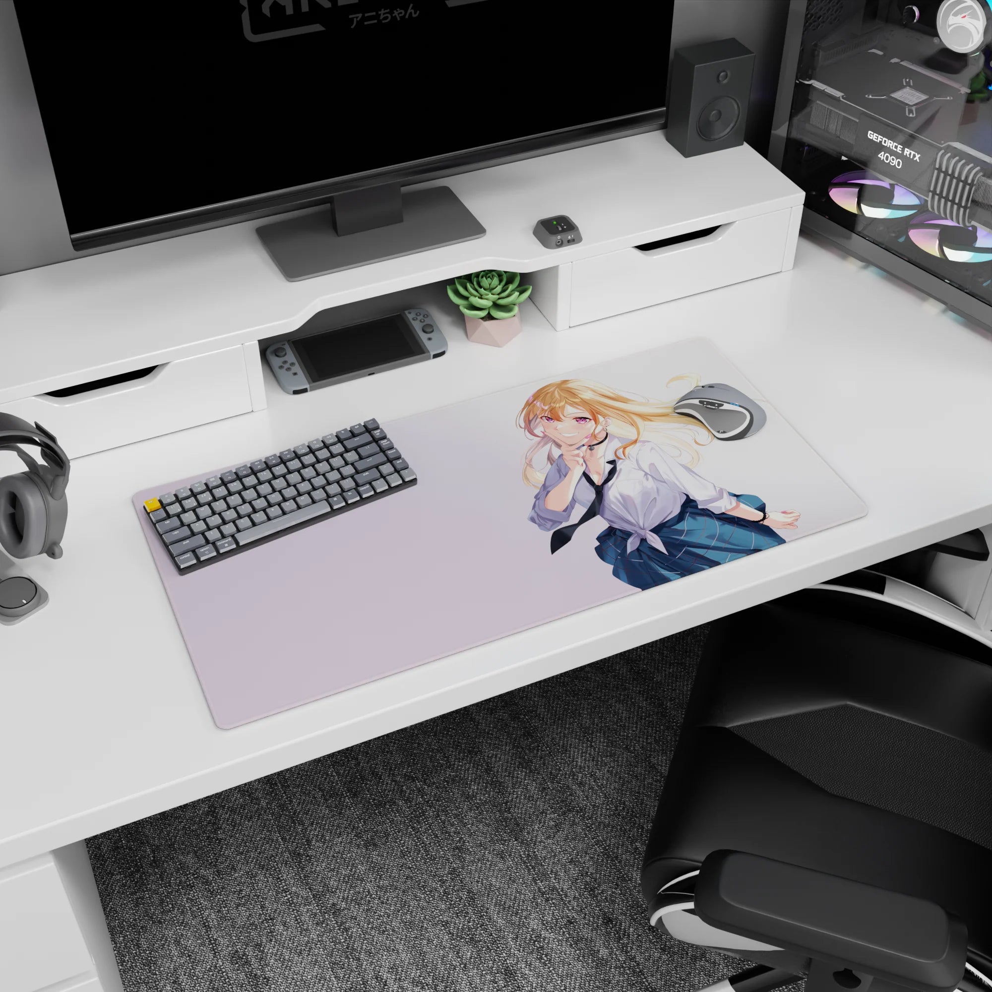 32x16 inches mouse pad shows blonde anime schoolgirl leaning in, finger to lips, hair blowing, playful pose.