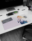 32x16 inches mouse pad shows blonde anime schoolgirl leaning in, finger to lips, hair blowing, playful pose.
