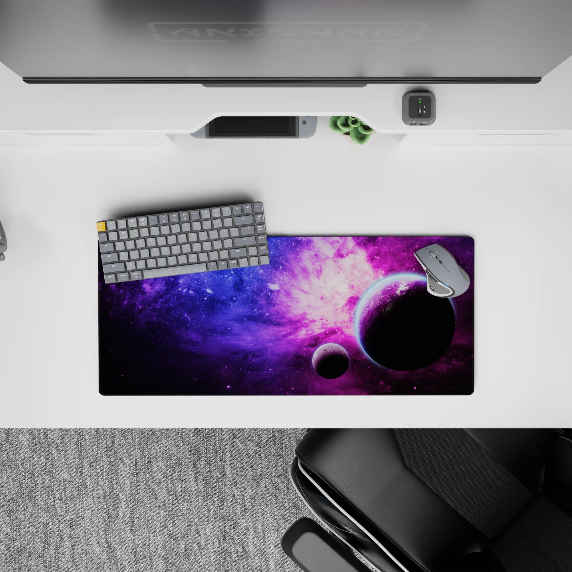 Dreamy 28x12 inches mouse pad in deep blue, electric violet, and cotton-candy pink clouds.