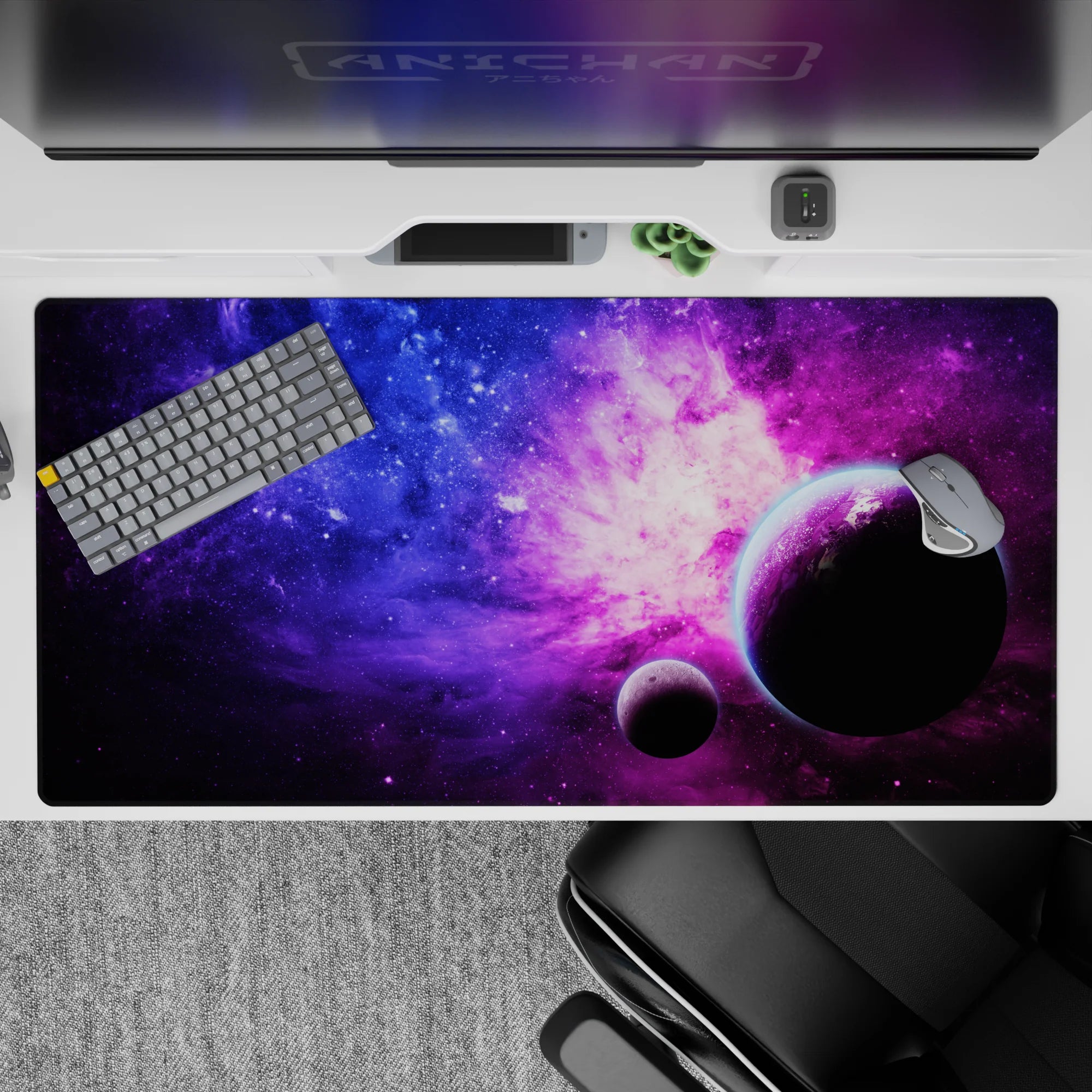 Dreamy 40x20 inches desk pad in deep blue fading to violet with cotton-candy pink cloud glow.