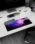 28x12 inches mouse pad featuring two shadowy planets drifting through starry purple-blue space.